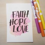 Aquarellkarte mit Handlettering "Faith hope love"