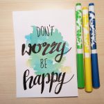 Aquarellkarte mit Handlettering "Don't worry be happy"