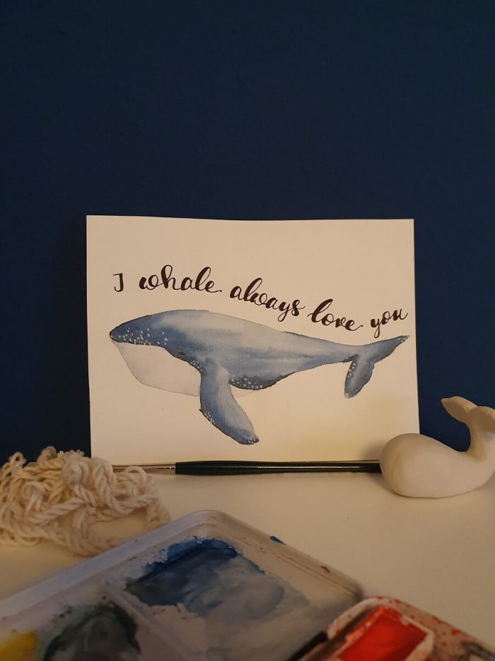 Aquarellbild mit Wal und Handlettering
